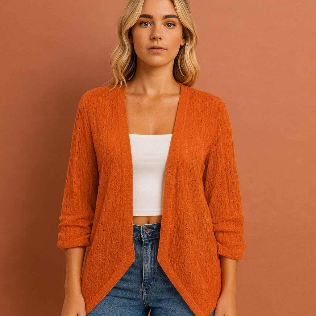 Women’s crochet cardigan in orange with open front, airy and stylish for casual and bohemian outfits.