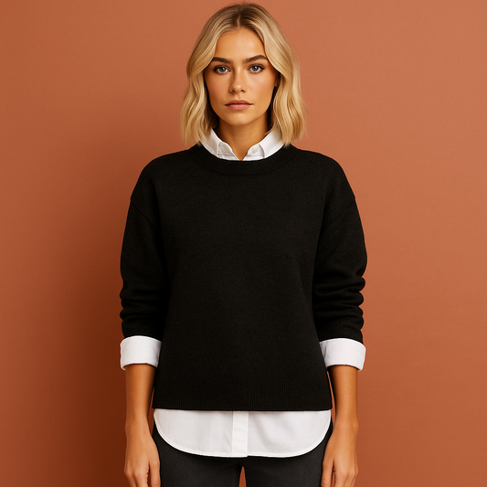 Women’s oversized sweater in black with casual fit, soft and comfortable for everyday and stylish outfits.